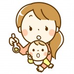 赤ちゃんに離乳食を与える保育士